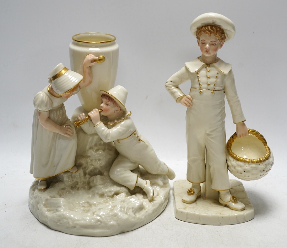 A Worcester figural bud vase and a figure of a boy holding a basket, largest 22cm high. Condition - good